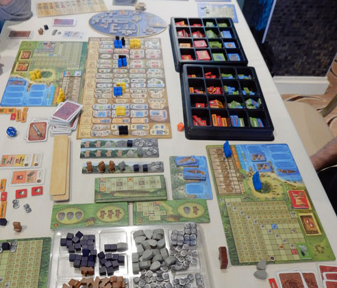 A Feast for Odin in play: lots and lots of cardboard and wooden bits