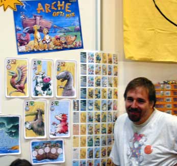Frank Nestel poses in front of a display of Arche Opti Mix