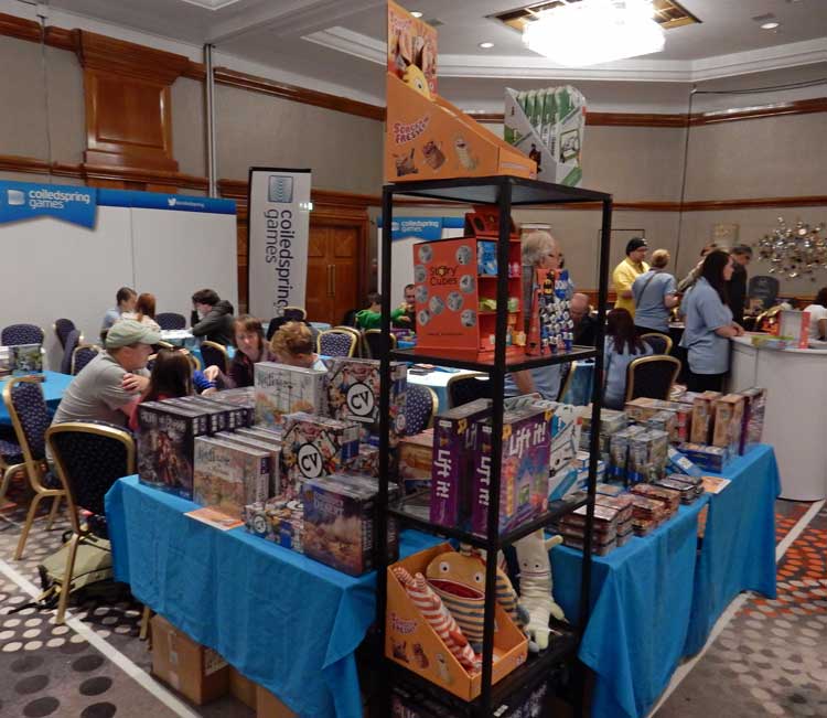 Part of Coildespring's area at the 2015 UK Games Expo with lots of people playing games
