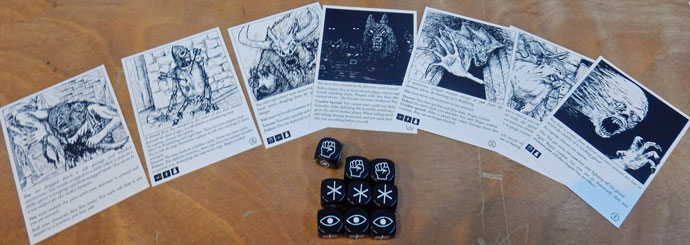 Cards and dice from Escape the Dark Castle