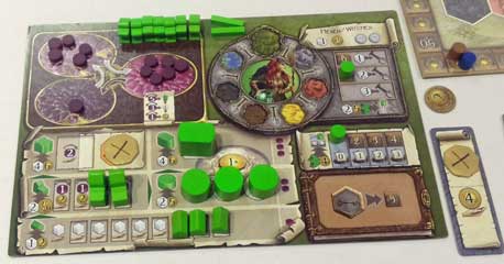 My player board - I was playing the bright green witches